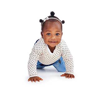 baby smiling and crawling