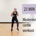 instructor leading a sitting student in cardio workout