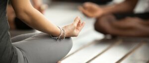 Women meditating in group