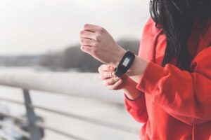 woman wearing clock