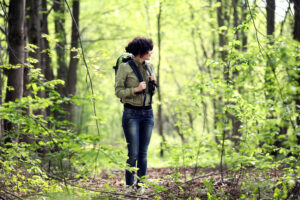 woman walking in a forest