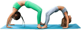 Two young girls doing yoga together