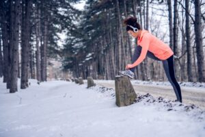 Woman stretching-in-winter