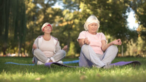 Older women doing yoga