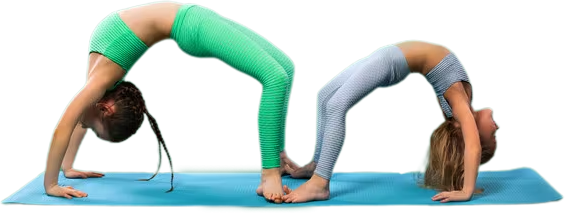 Two young girls doing yoga together