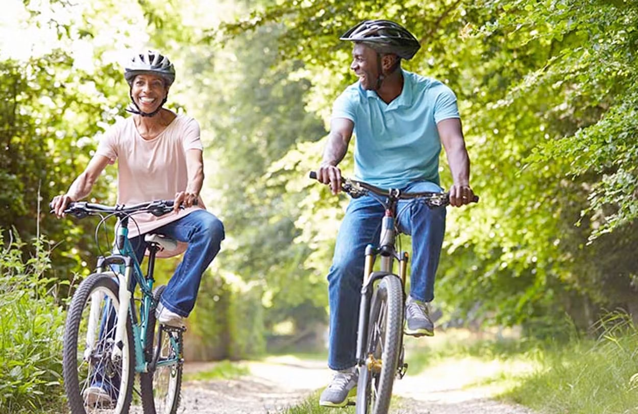 senior couple running bikes