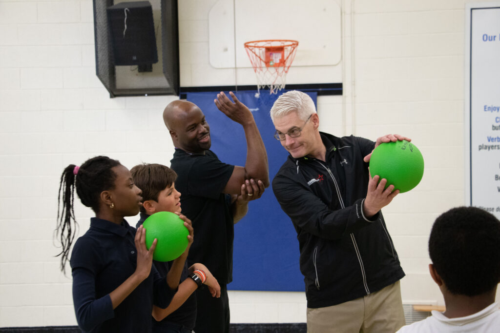 Blog header image alt physical education teacher teaching children