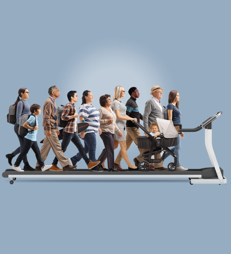 A group of people walking on giant treadmill