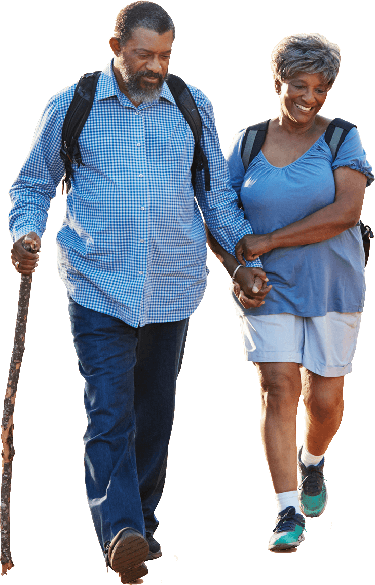 Senior aged couple hiking in sportwear Senior aged couple hiking in sportwear