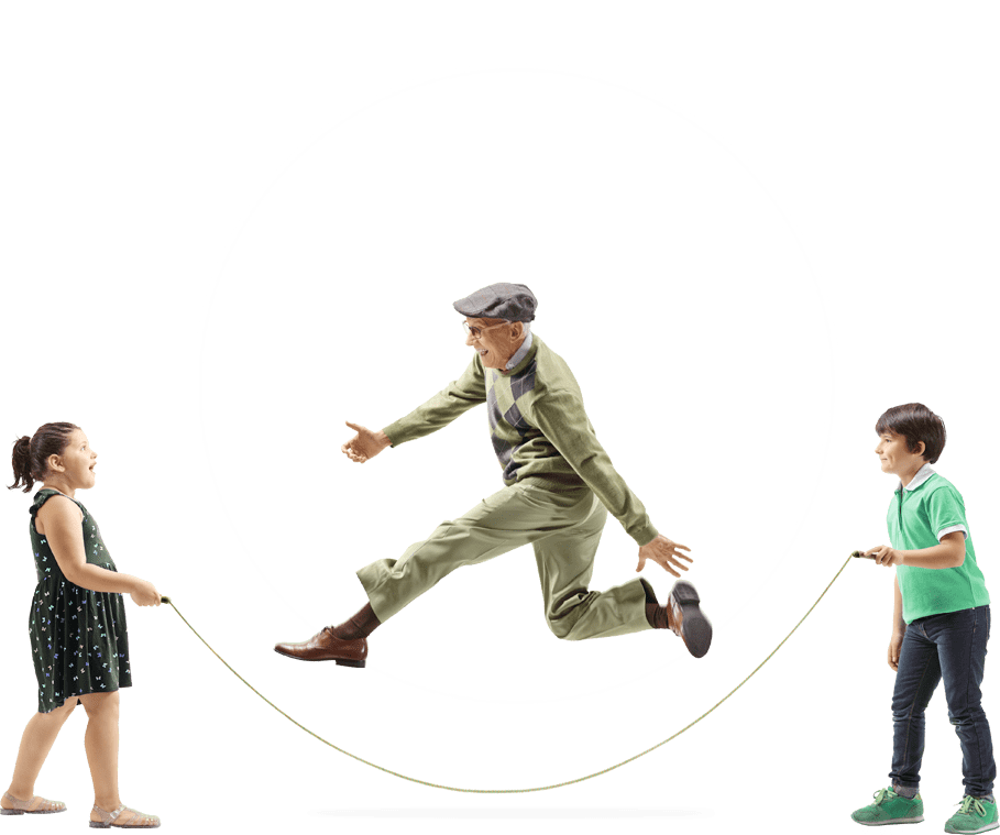 An older man skipping with two children holding the rope