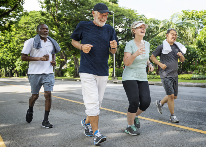 Diverse group of seniors jogging together Diverse group of seniors jogging together