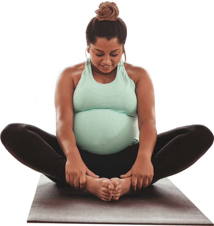 Pregnant woman doing yoga