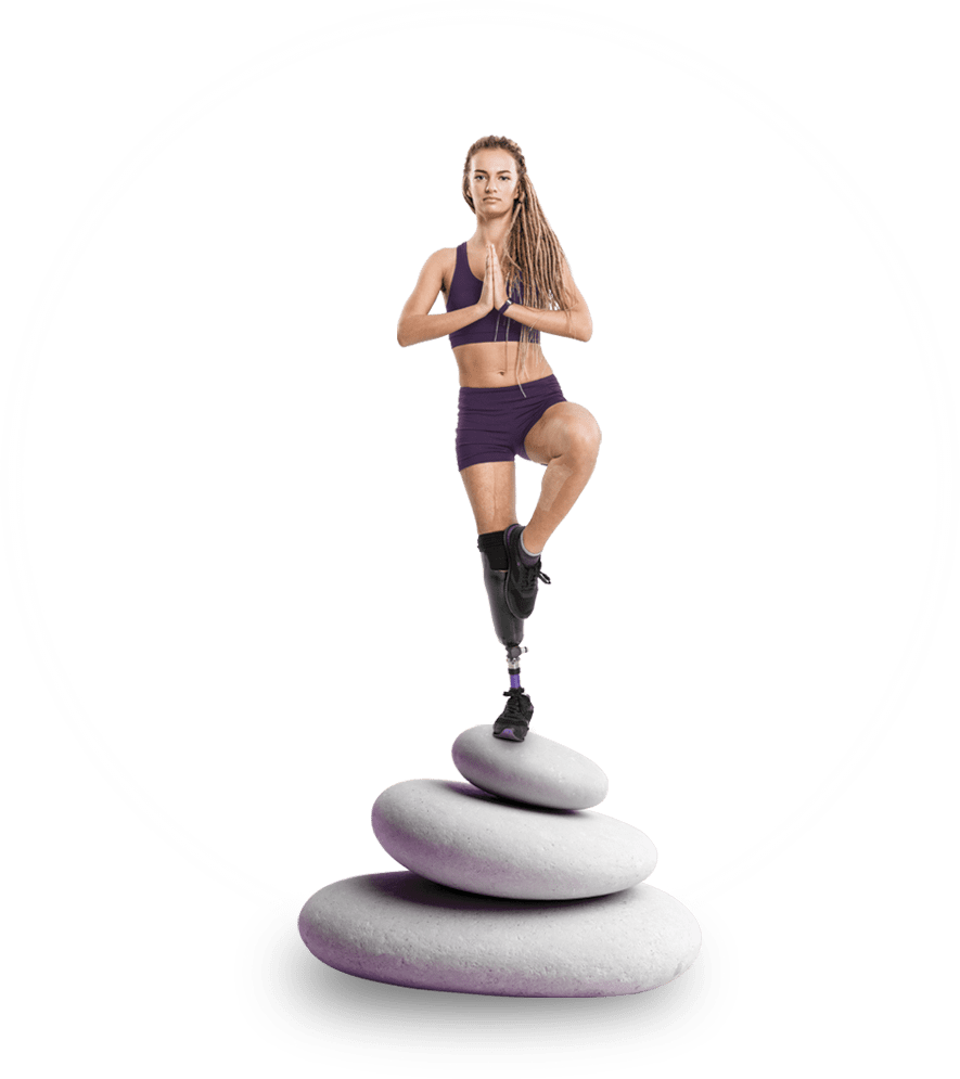 A woman balancing on large stones