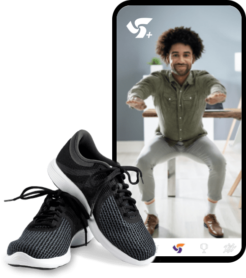 A pair of black-and-white running shoes beside a smartphone screen displaying a photo of a man squatting A pair of black-and-white running shoes beside a smartphone screen displaying a photo of a man squatting