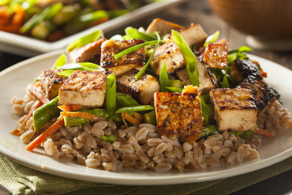 Tofu and vegetables on a bed of rice
