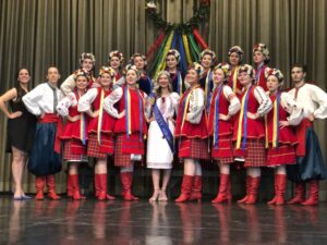 A group of Ukrainian dancers, including ParticipACTION’s social media and marketing coordinator, Stephanie Ehmke, standing on a stage.