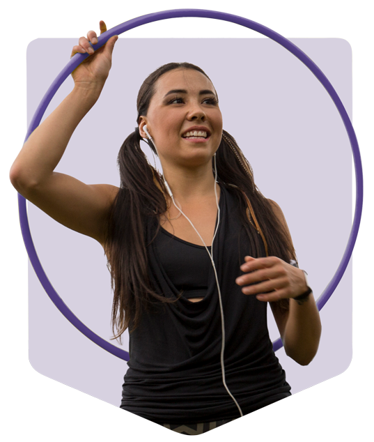 girl holding hoola hoop and smiling girl holding hoola hoop and smiling