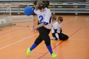 A group of women playing goalball.
