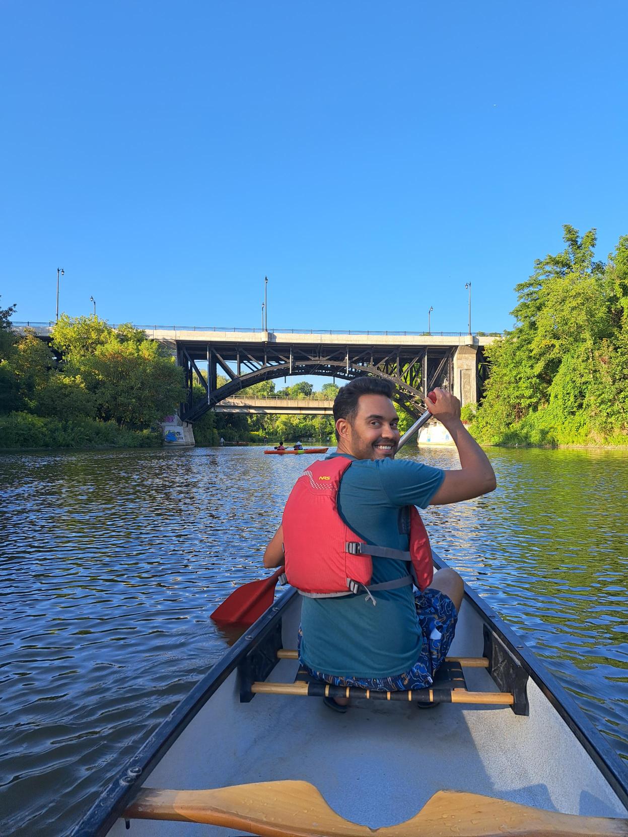 Adam Hunter canoeing on the Humber River in Toronto. 