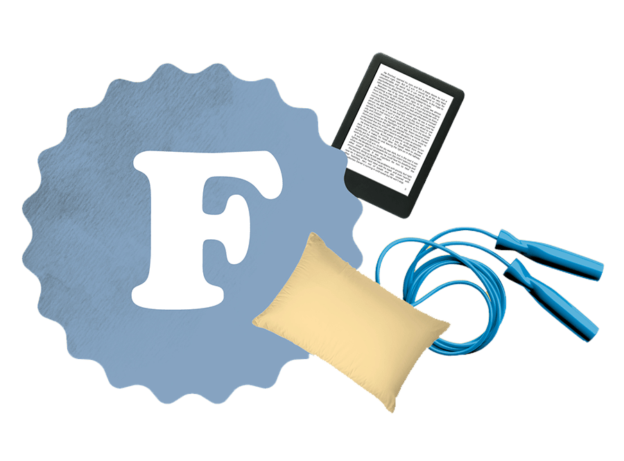 An F grade beside an e-reader, pillow and jump rope.