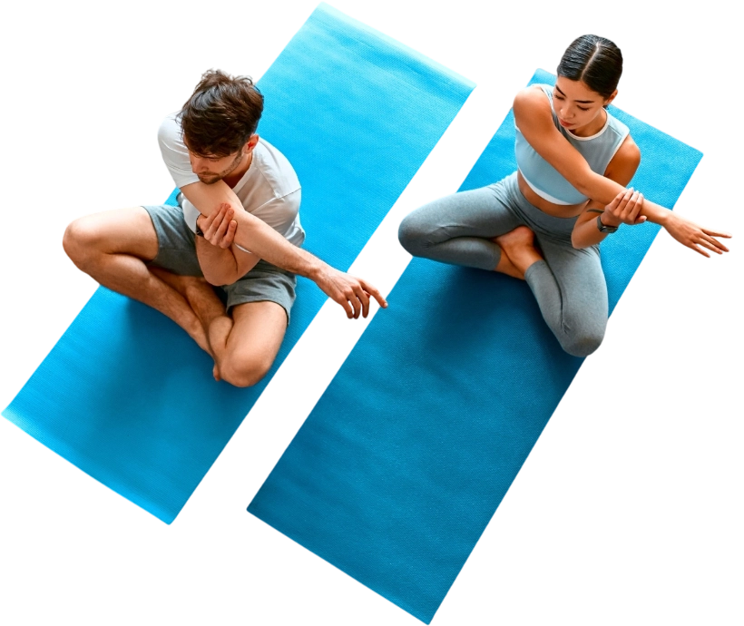 yoga-image-1 An aerial view of a man and woman doing yoga.
